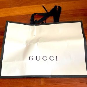 Gucci store shopping bag